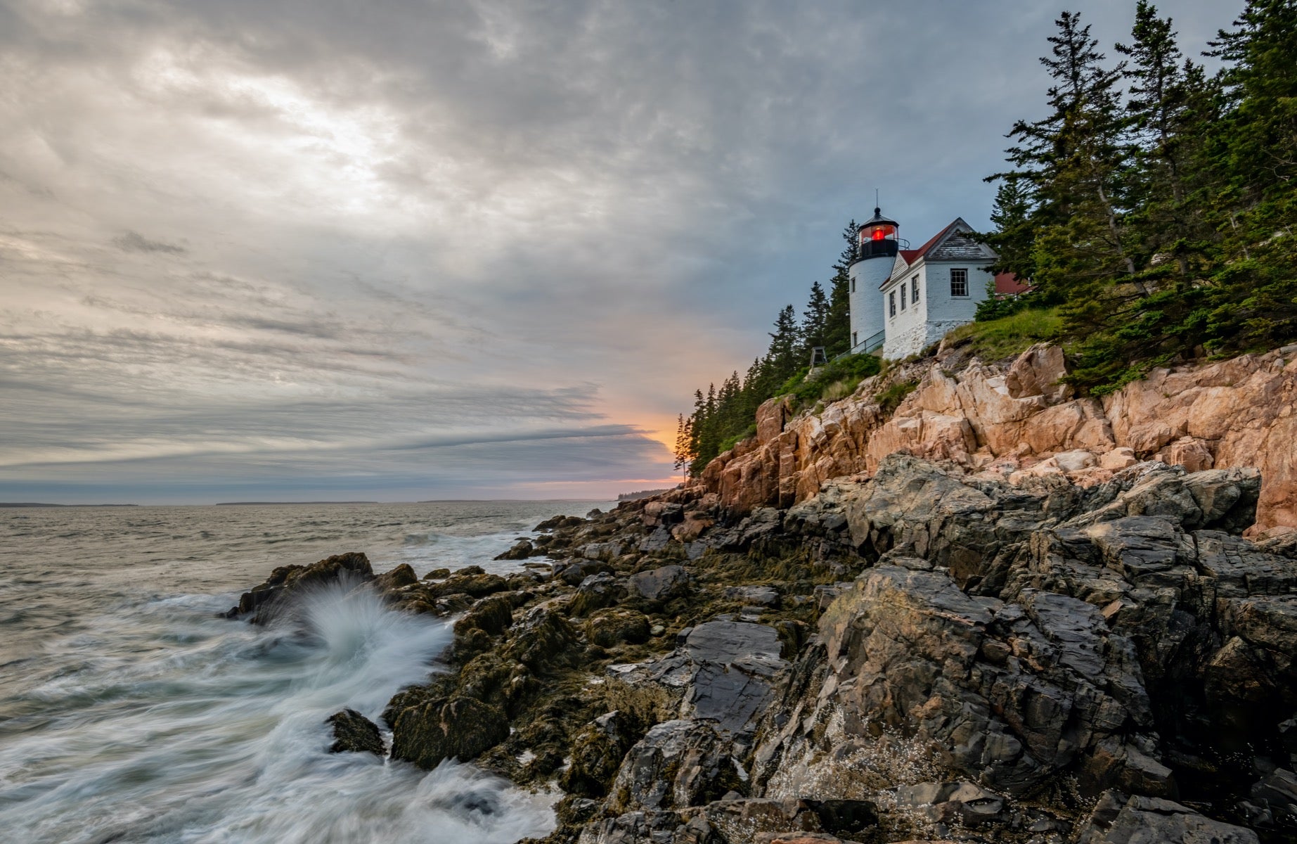 White lighthouse along the rocks