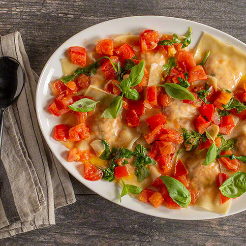 Lobster Ravioli on White Plate