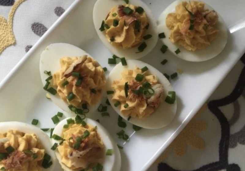 Deviled eggs on a white plate