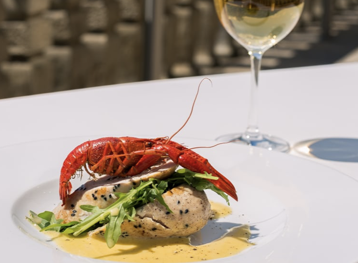 Crawfish served on a white plate and table